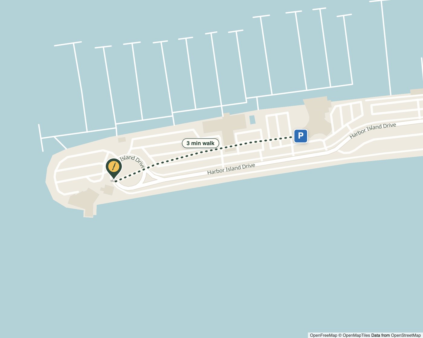 Map of the west point of Harbor Island in San Diego Bay: a PleinScout spot pin on the point, parking along Harbor Island Drive, and a dotted three-minute walking route between them, with marina docks to the north
